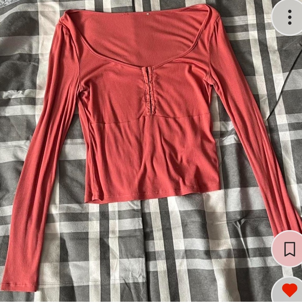 Long sleeve coral top with corset detail on front